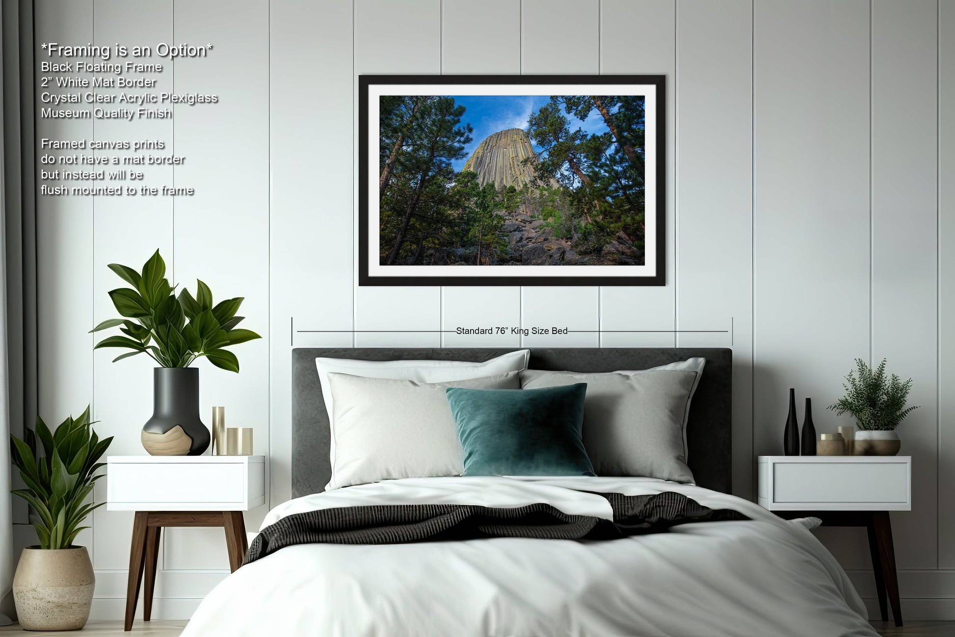 a bedroom with a bed and a picture hanging on the wall