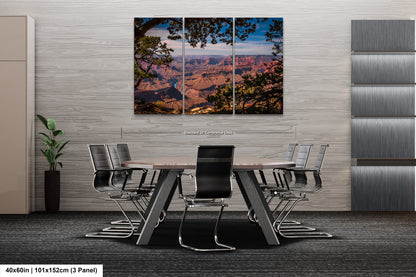 a dining room table with a view of the grand canyon