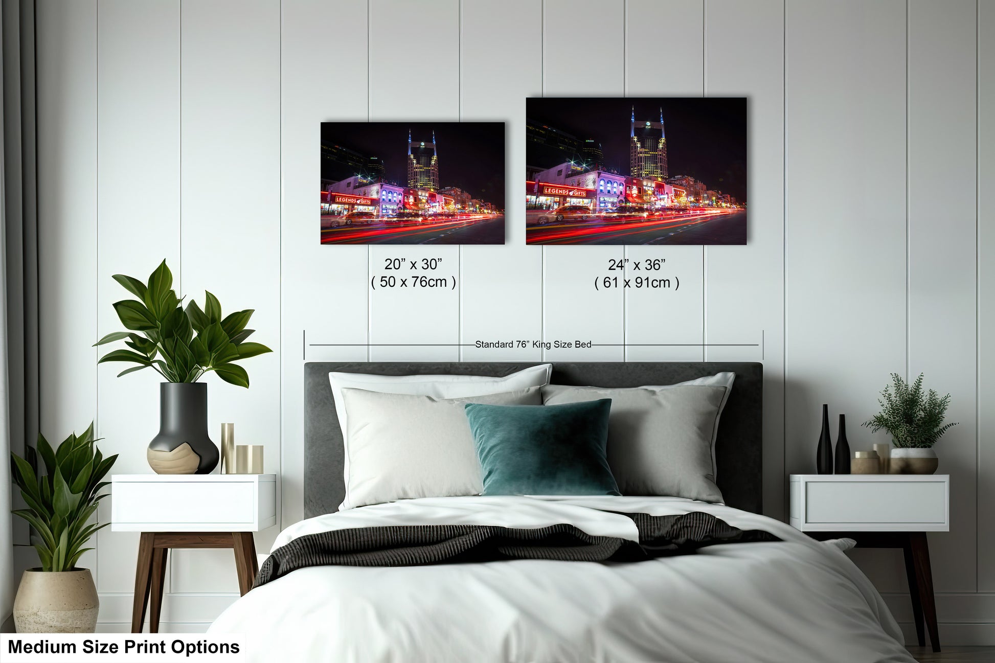 a bedroom with a bed and two pictures on the wall