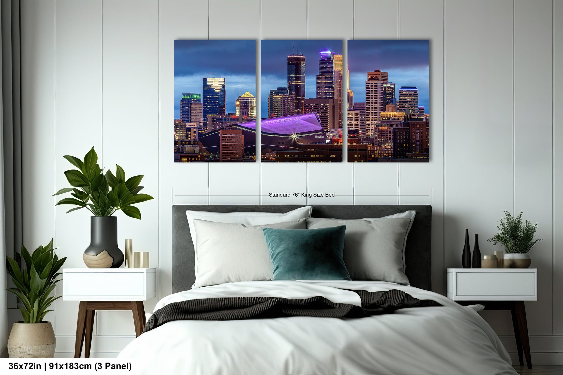 a bedroom with a large bed and a city skyline in the background
