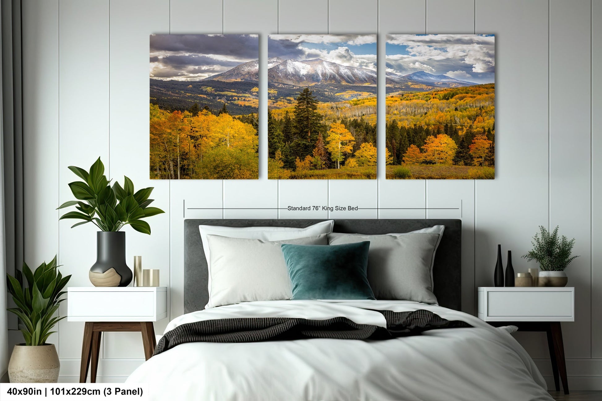 a bed room with a neatly made bed and three pictures on the wall