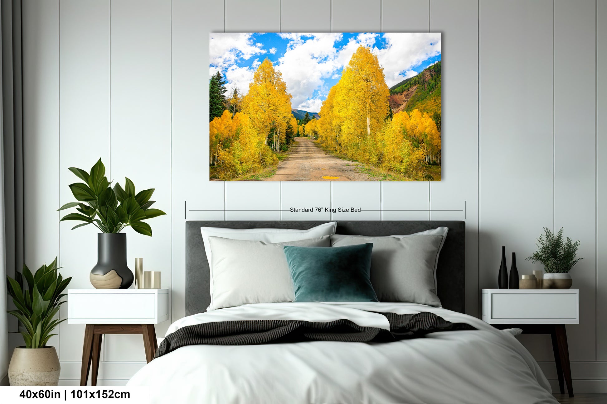 a bedroom scene with a bed and a painting on the wall