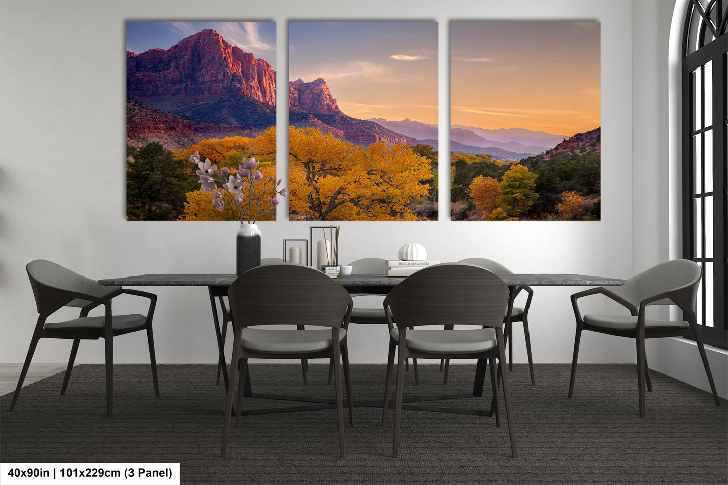 a dining room with a table and four chairs