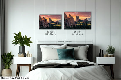 a bed room with a neatly made bed and two pictures on the wall