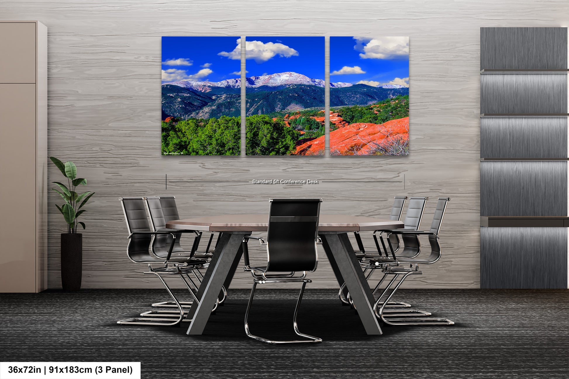 a dining room with a table and chairs with mountains in the background