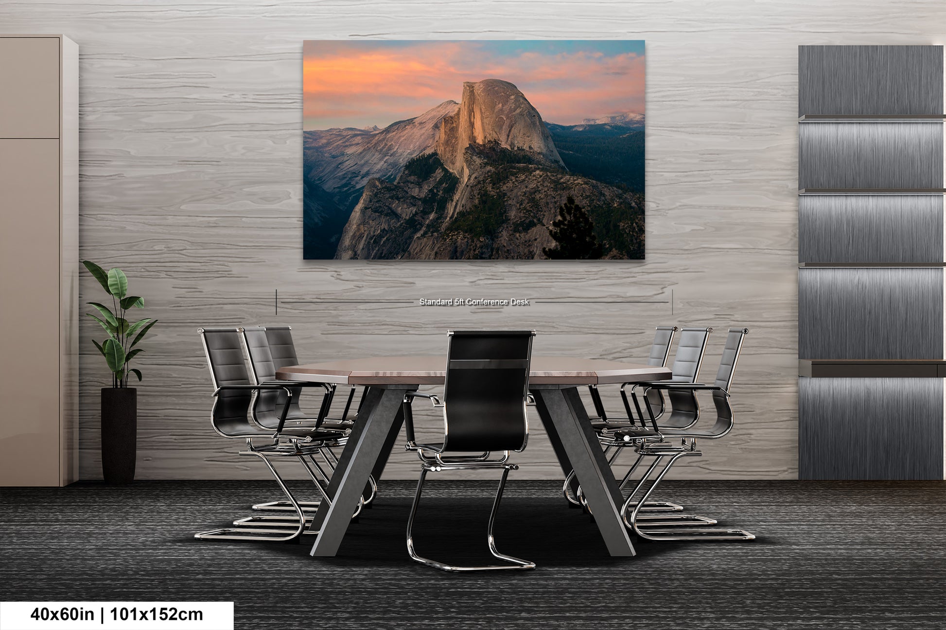 a dining room table with a mountain in the background