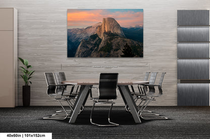 a dining room table with a mountain in the background