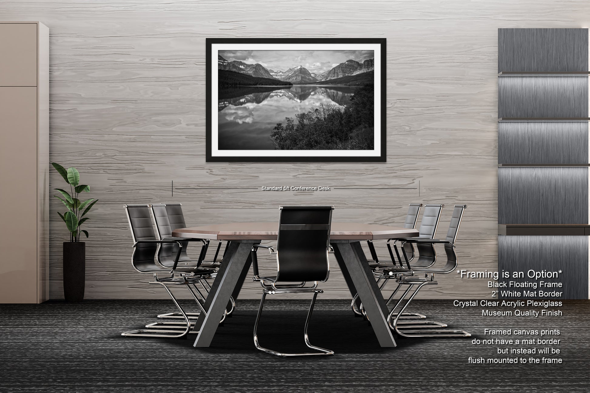 a black and white photo of a table and chairs