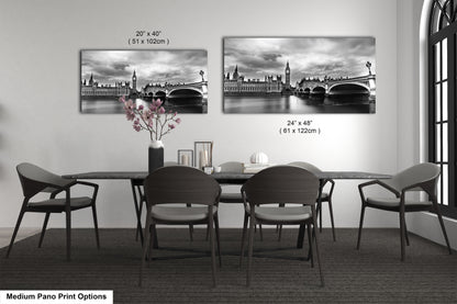a black and white photo of a dining room table