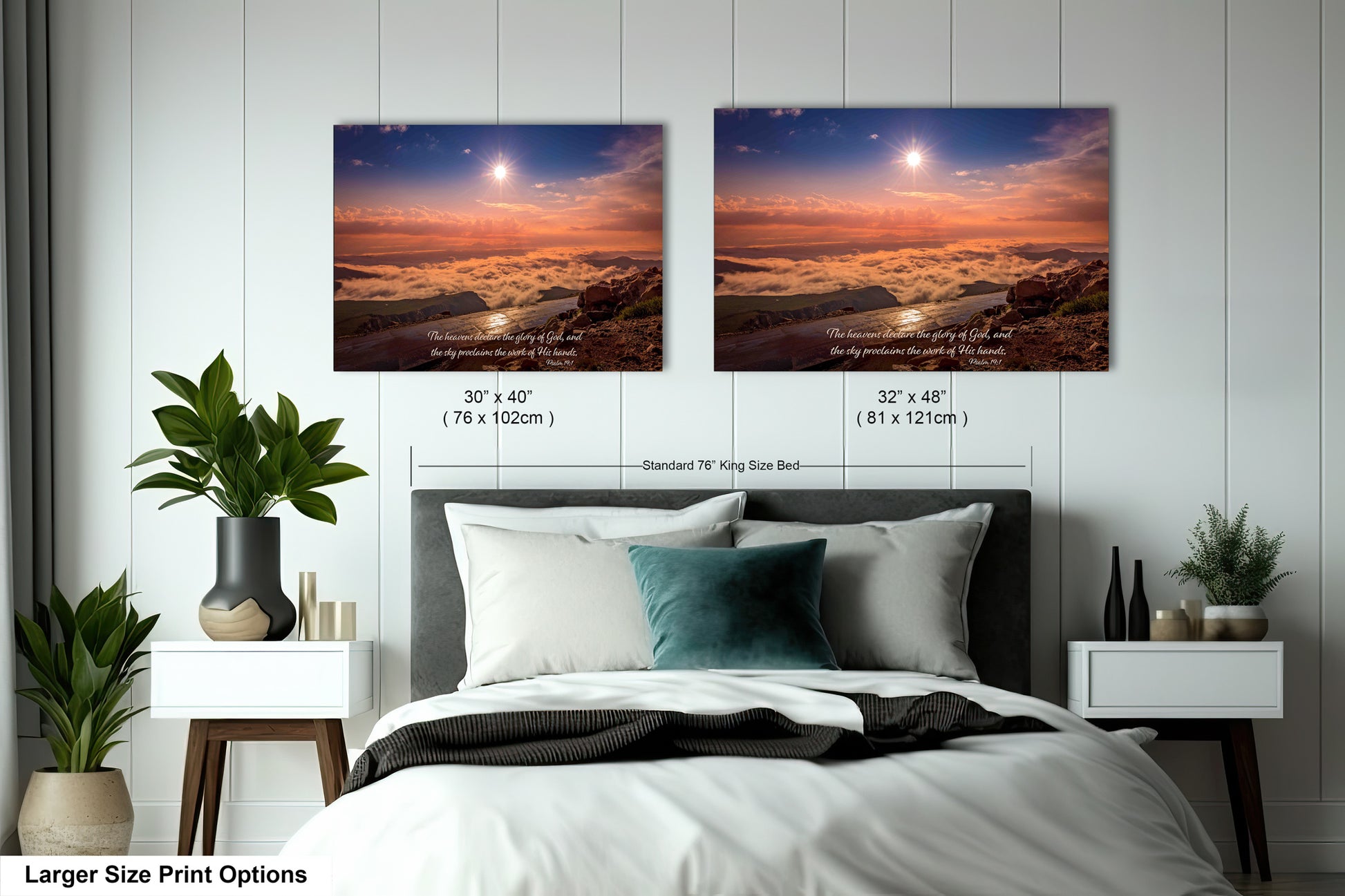 a bed with two pictures on the wall above it