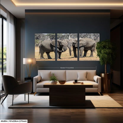a living room filled with furniture and a painting of elephants