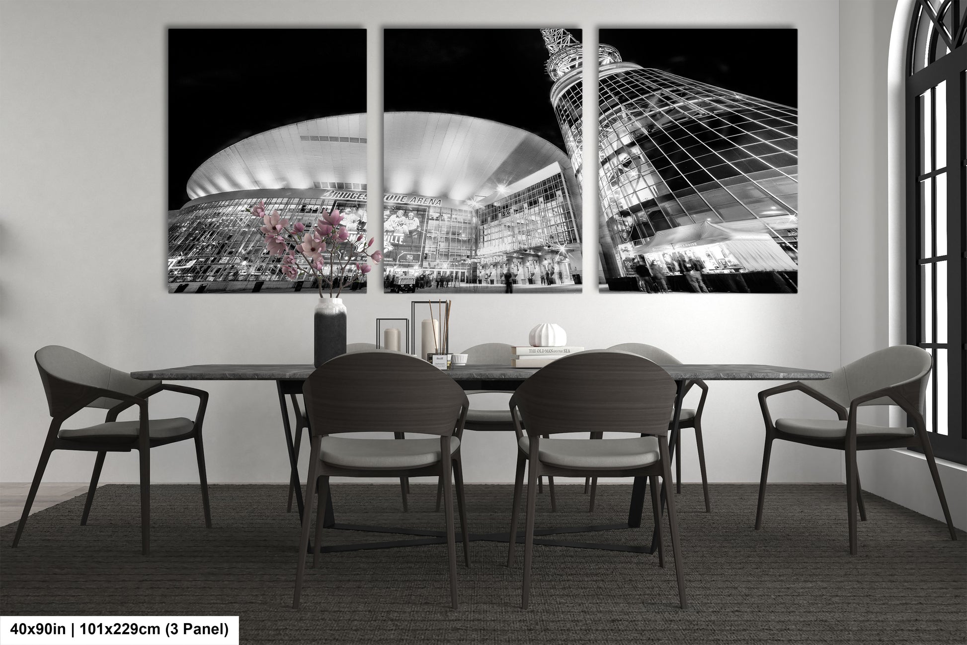 a black and white photo of a dining room