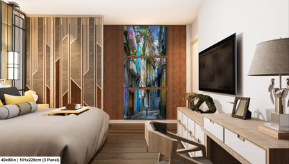 a bed room with a neatly made bed and a flat screen tv
