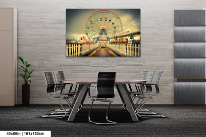 a dining room table with a ferris wheel in the background