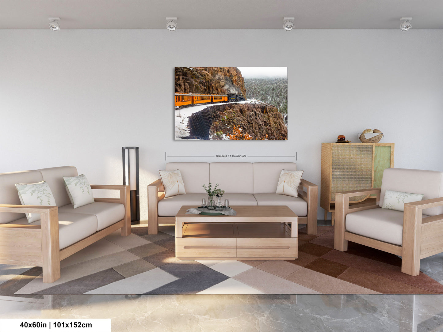 a living room filled with furniture and a painting on the wall