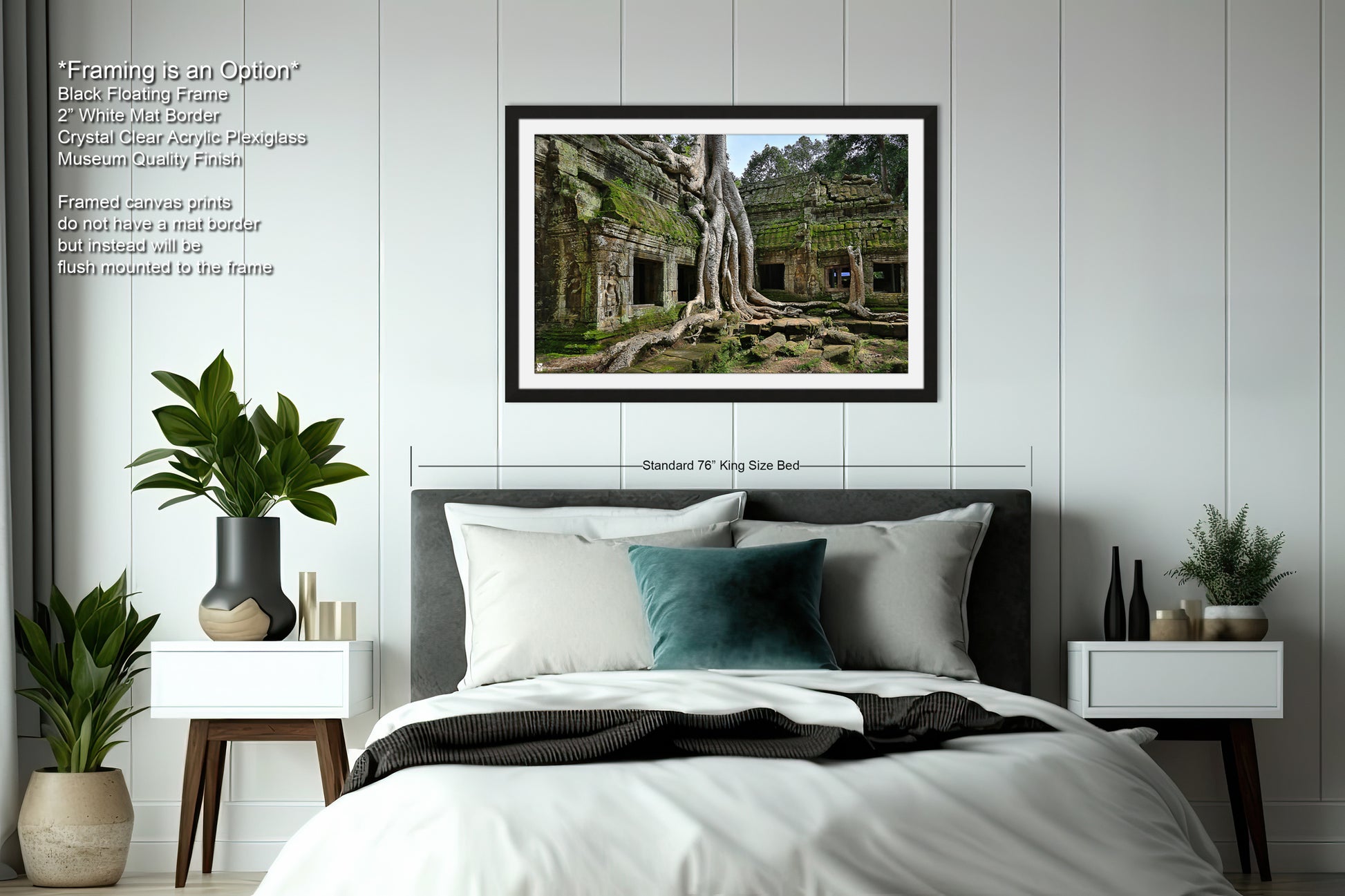 a bedroom with a bed and a picture hanging on the wall