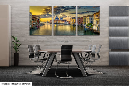 a dining room table with chairs and a painting on the wall
