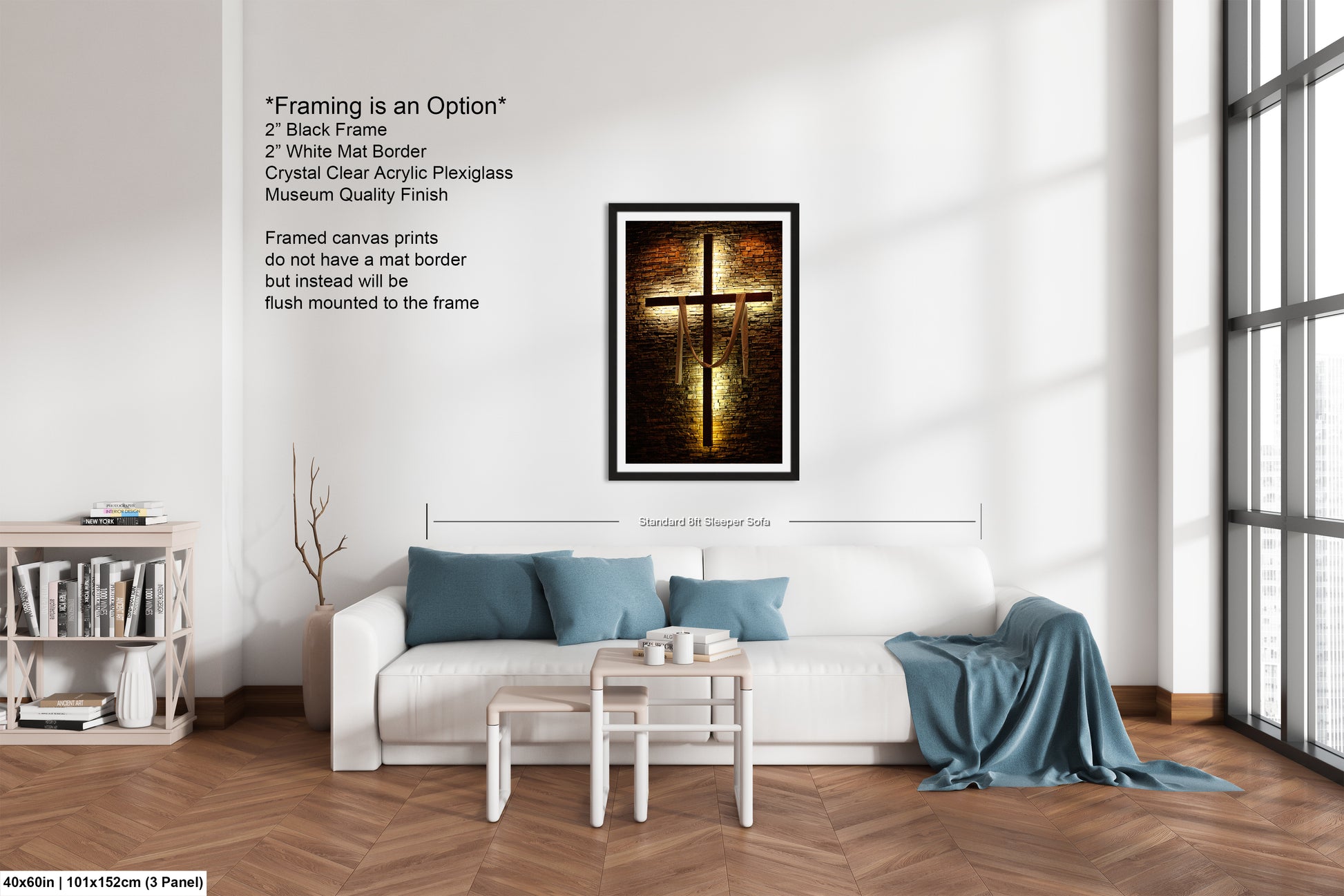 a living room with a white couch and a cross on the wall