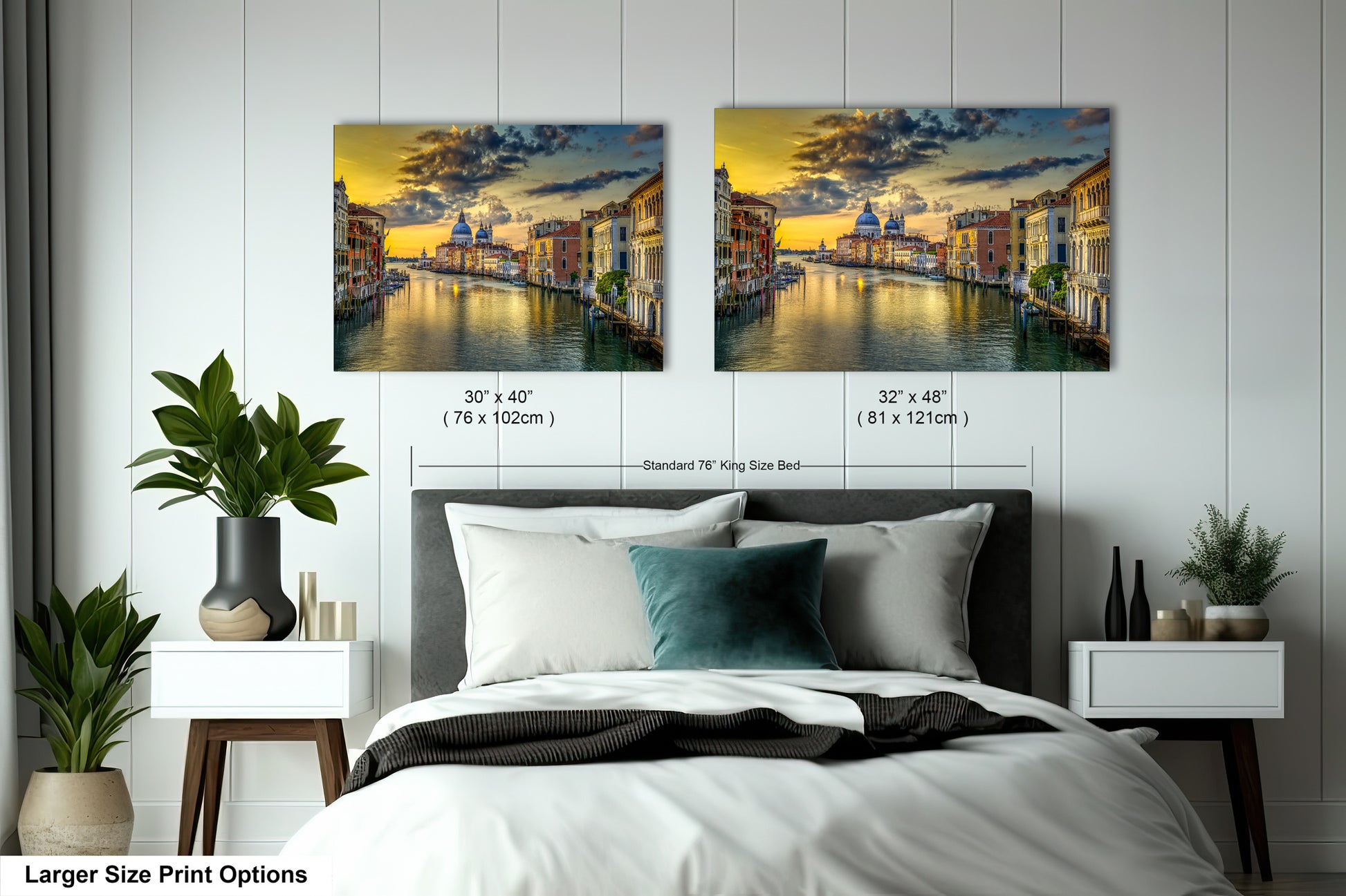 a bedroom with a bed and two pictures on the wall