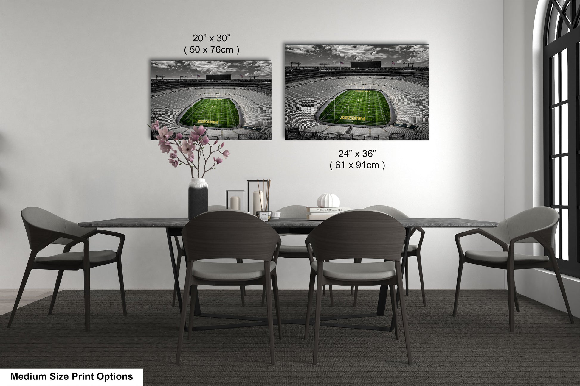 a dining room table with chairs and a vase with flowers