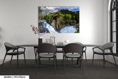 a dining room table with chairs and a painting on the wall