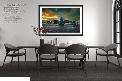 a picture of a dining room with a table and chairs