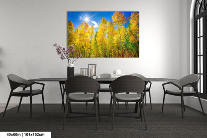 a dining room table with chairs and a painting on the wall