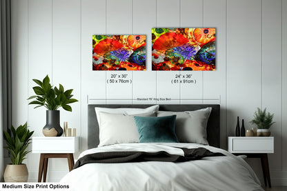 a bedroom with a bed and two paintings on the wall