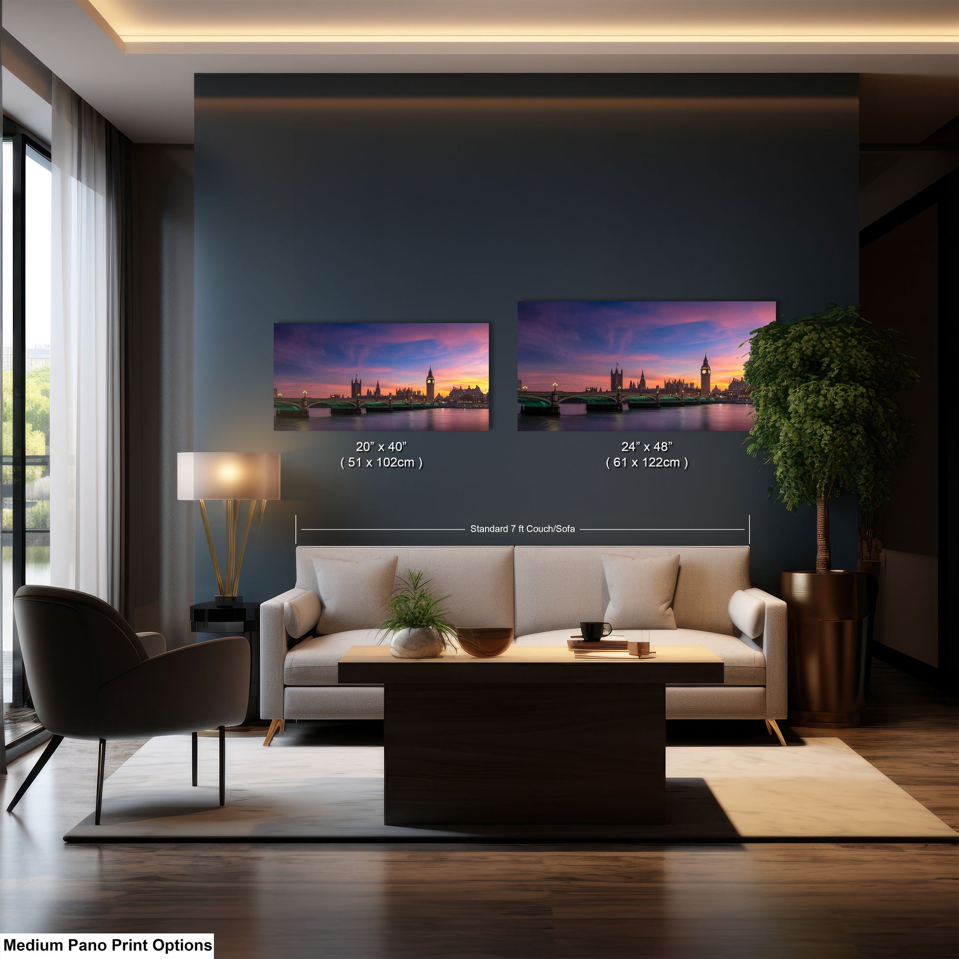 a living room with a couch and two pictures on the wall