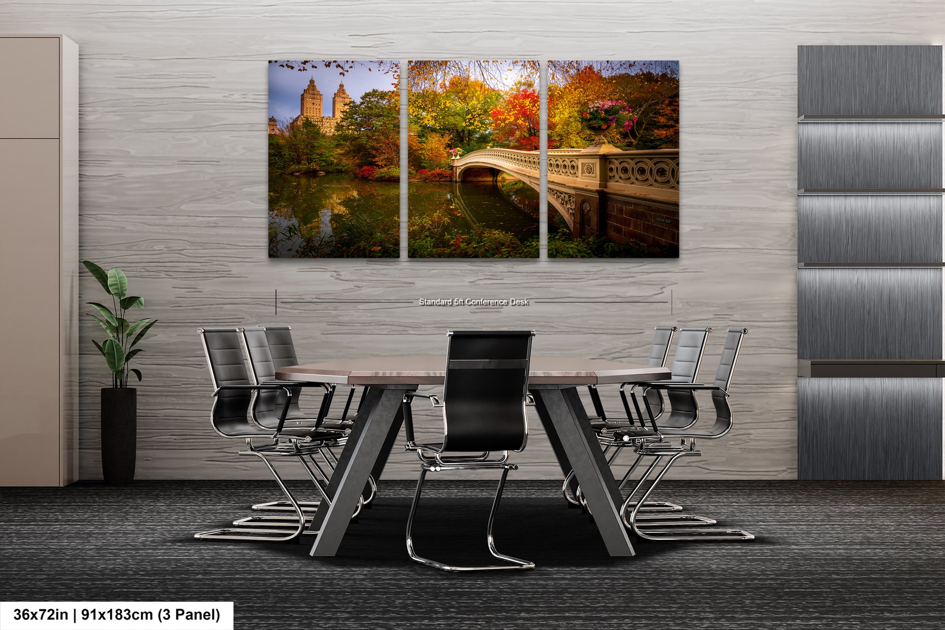A modern office space with a large, three-panel landscape painting of Central Park in New York City hanging on the wall. The painting depicts the park's iconic landmarks and foliage during autumn. The office features a wooden table surrounded by black chairs, creating a professional and comfortable atmosphere.