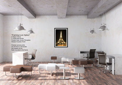a room with chairs, a desk and a picture of the eiffel tower