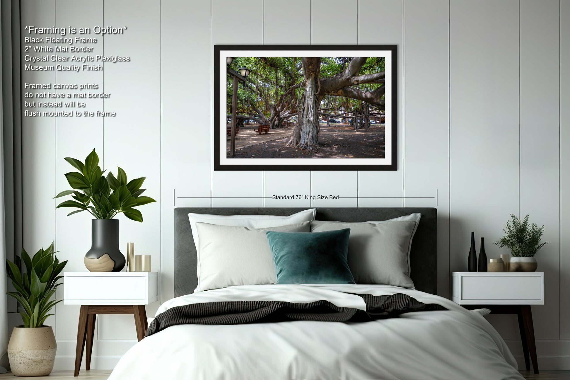 a bedroom with a bed and a picture hanging on the wall