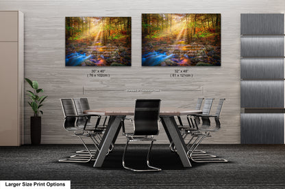 a dining room table with chairs and two pictures on the wall