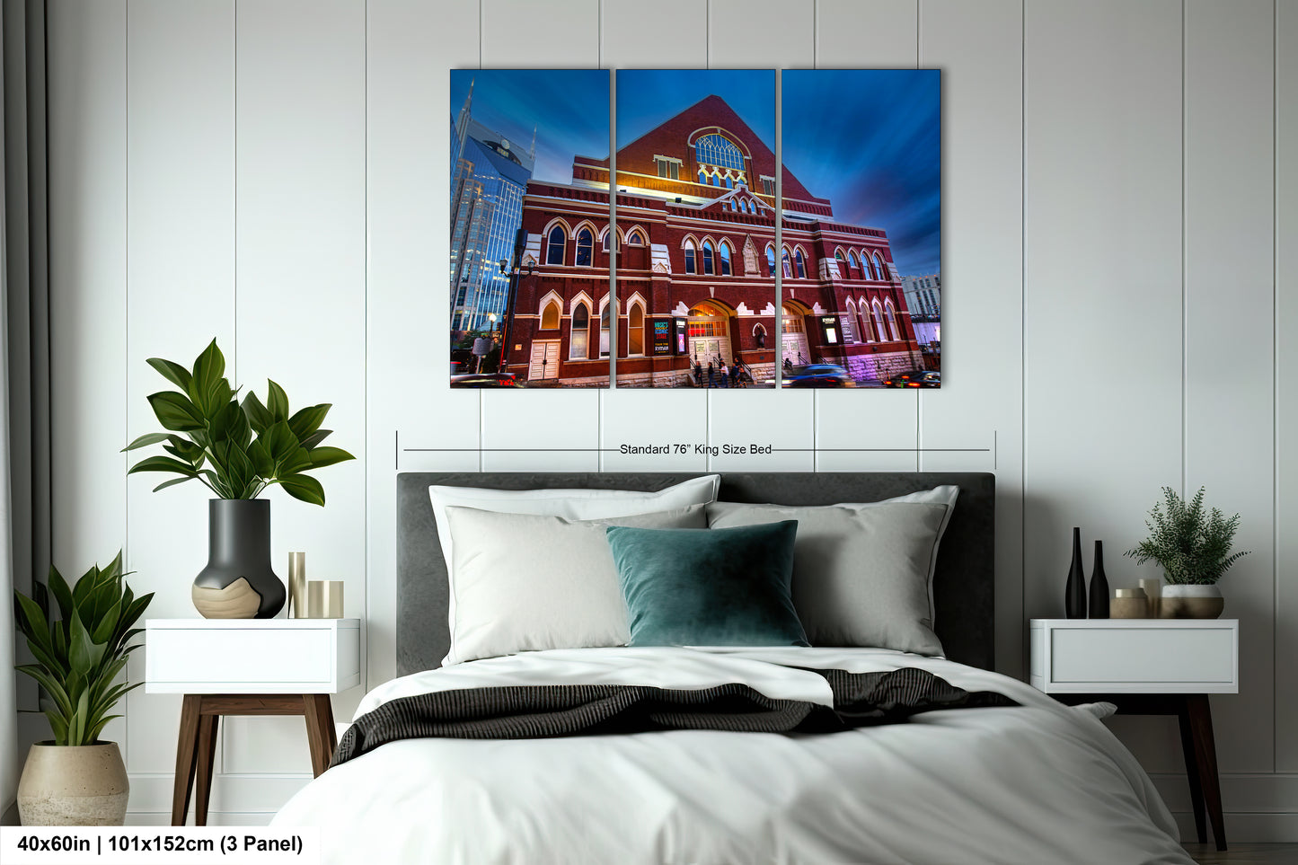a bedroom with a large bed and a painting on the wall