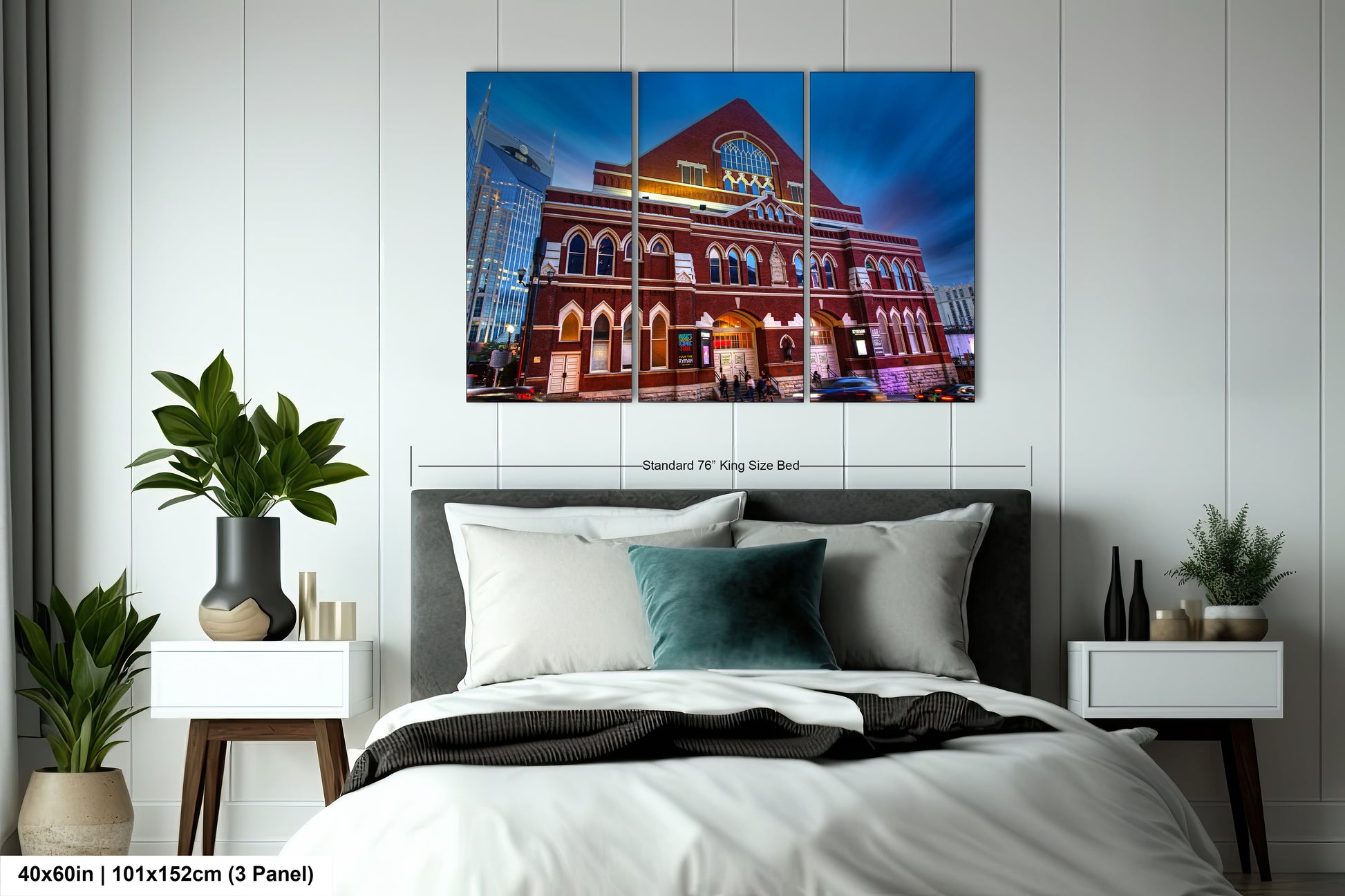 a bedroom with a large bed and a painting on the wall