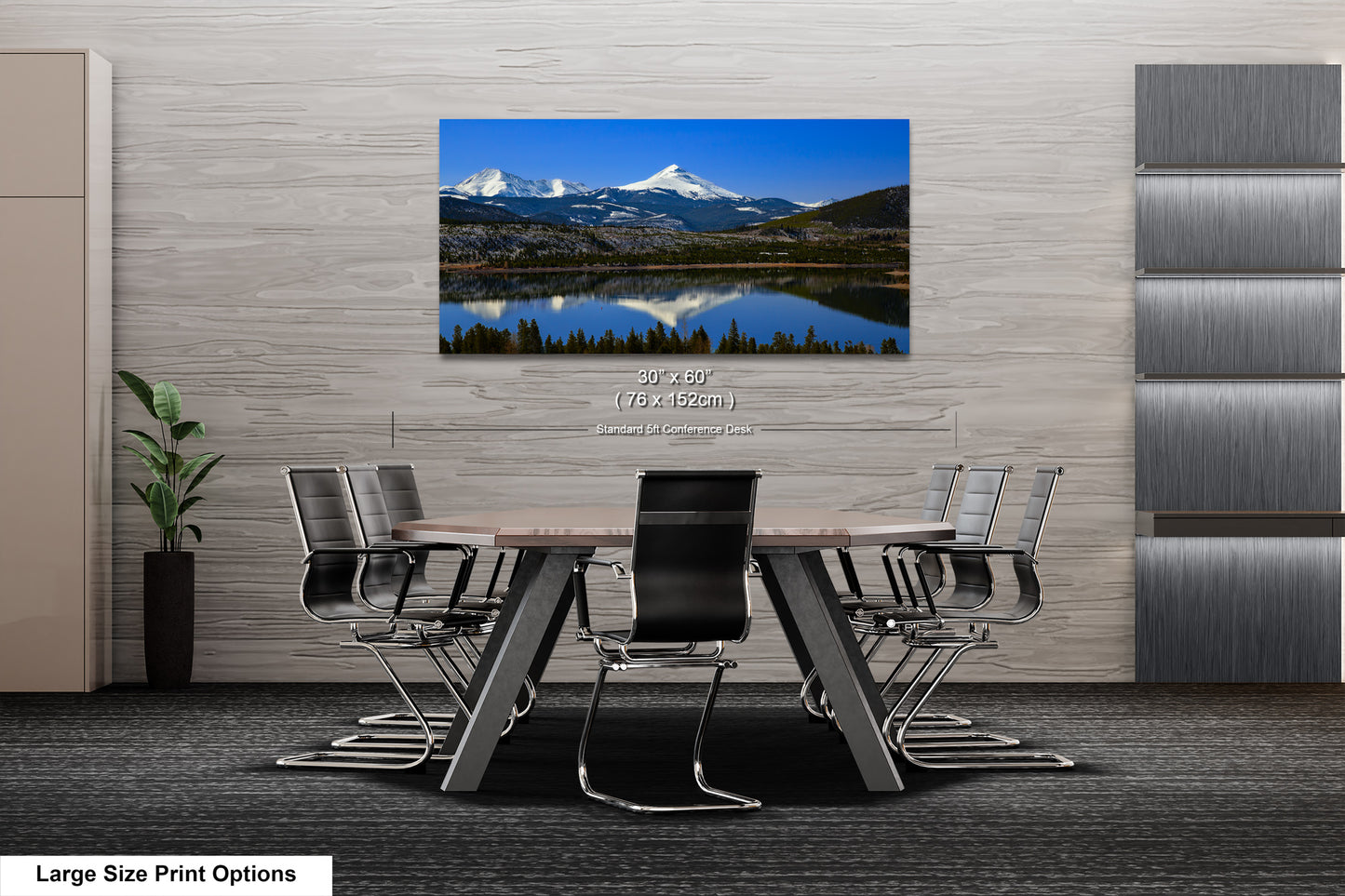 a dining room table with a view of a mountain range