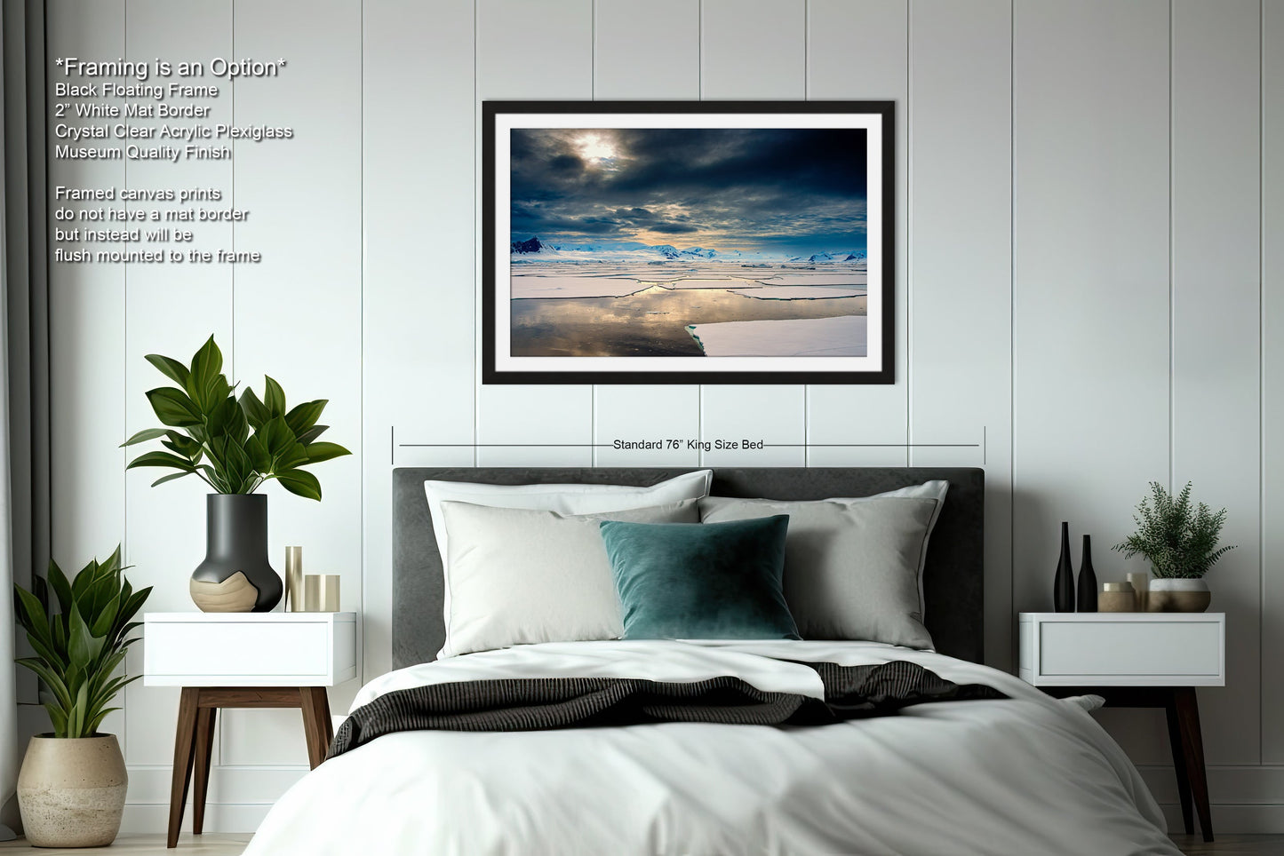 a bedroom with a bed and a picture hanging on the wall