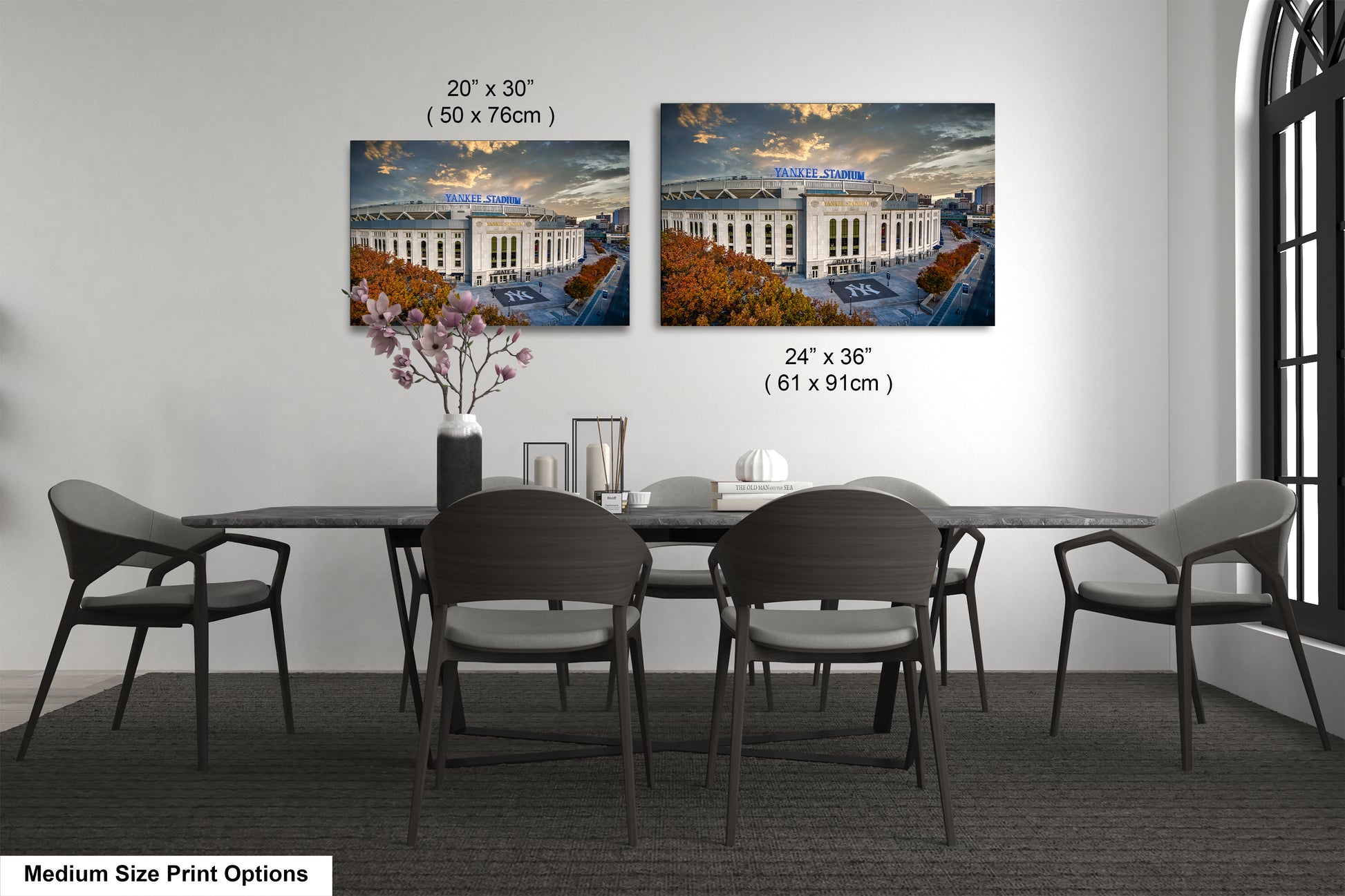 a dining room table with chairs and a vase of flowers