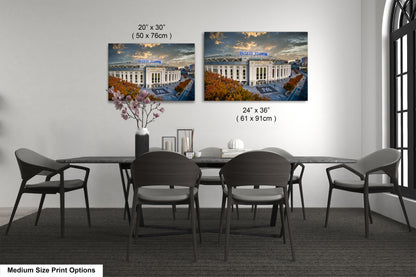 a dining room table with chairs and a vase of flowers