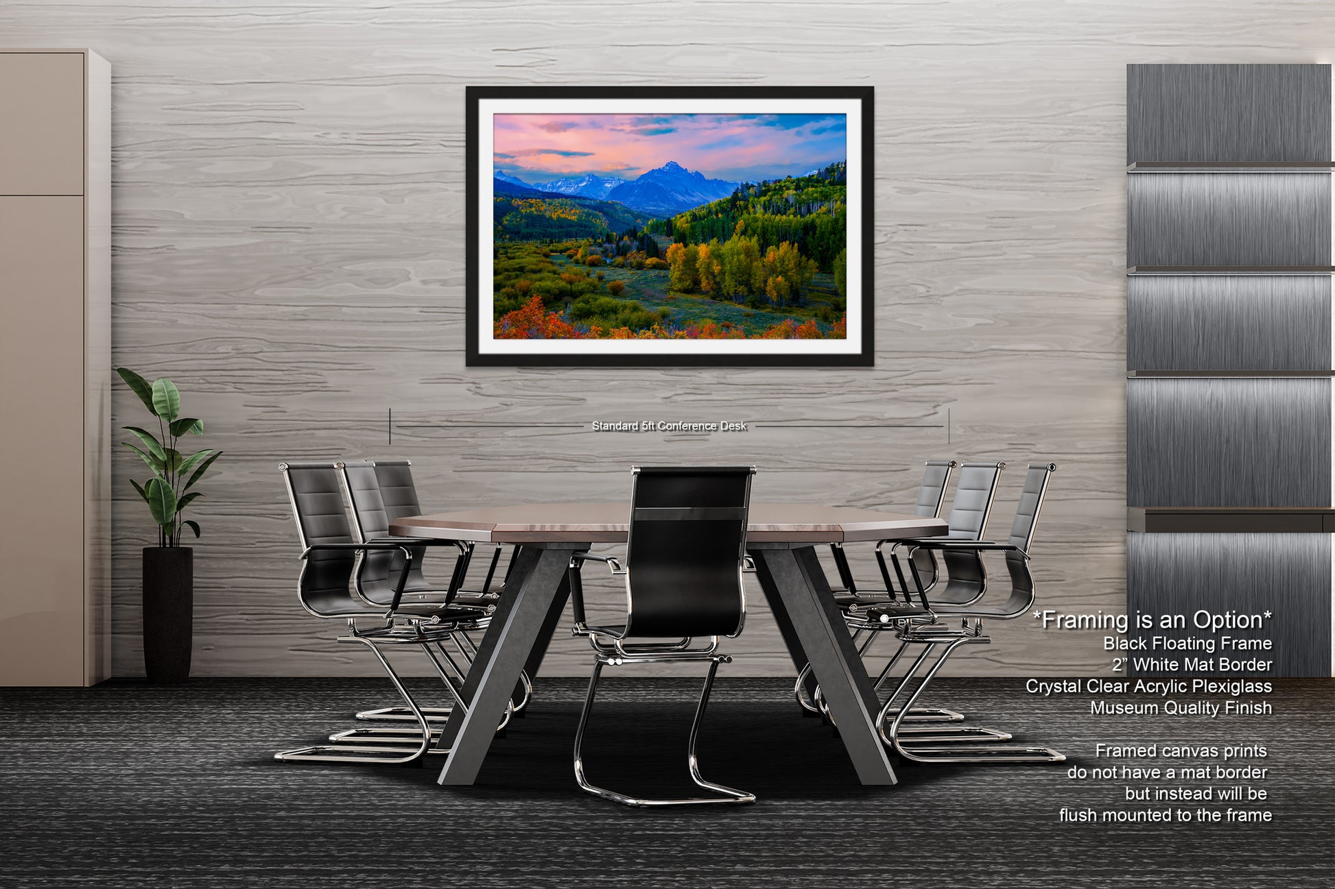 a dining room table with chairs and a painting on the wall