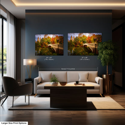 The image is a modern living room with a large sofa, a coffee table, and a potted plant. There are two framed landscape paintings on the wall, depicting a scenic view of a bridge and trees. The paintings are of similar size and style, and the dimensions are provided in the image.