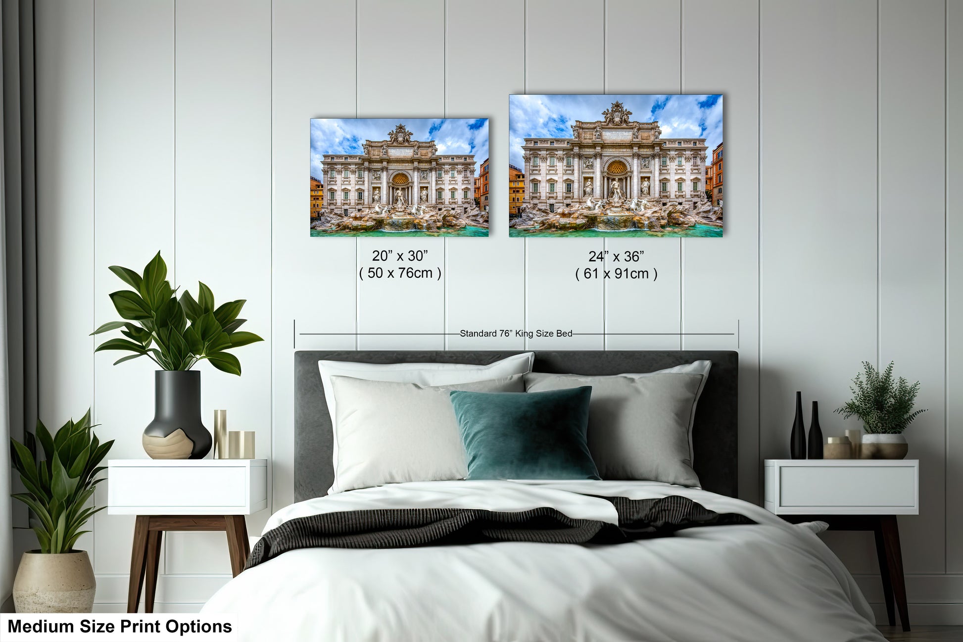 a bedroom with a bed and two pictures on the wall