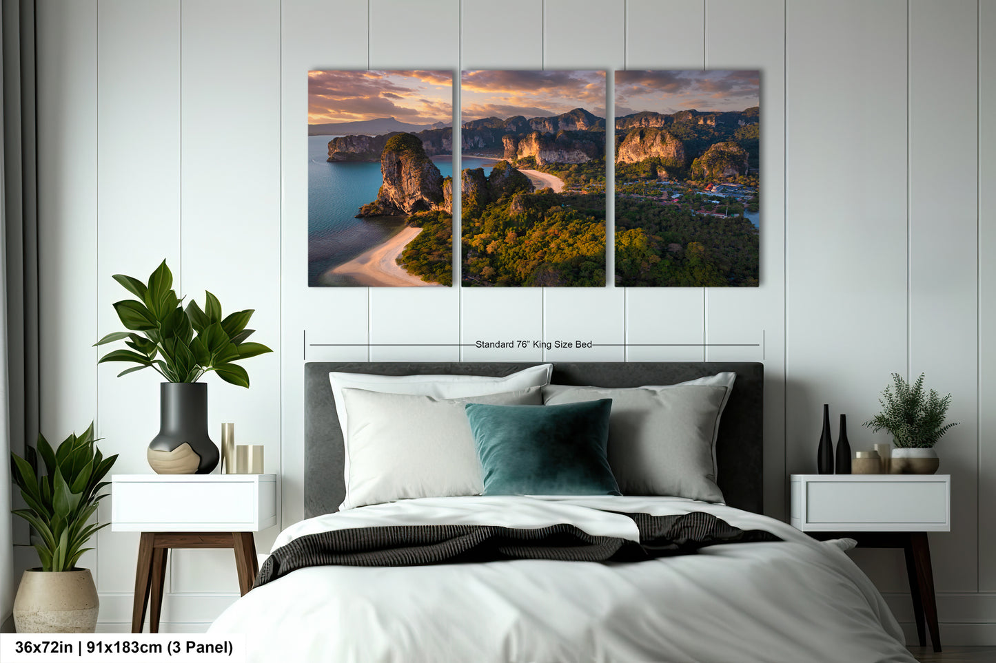 a bedroom with a bed and two paintings on the wall