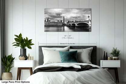 a black and white photo of a bedroom