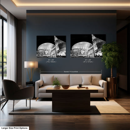 a living room with a couch and two pictures on the wall
