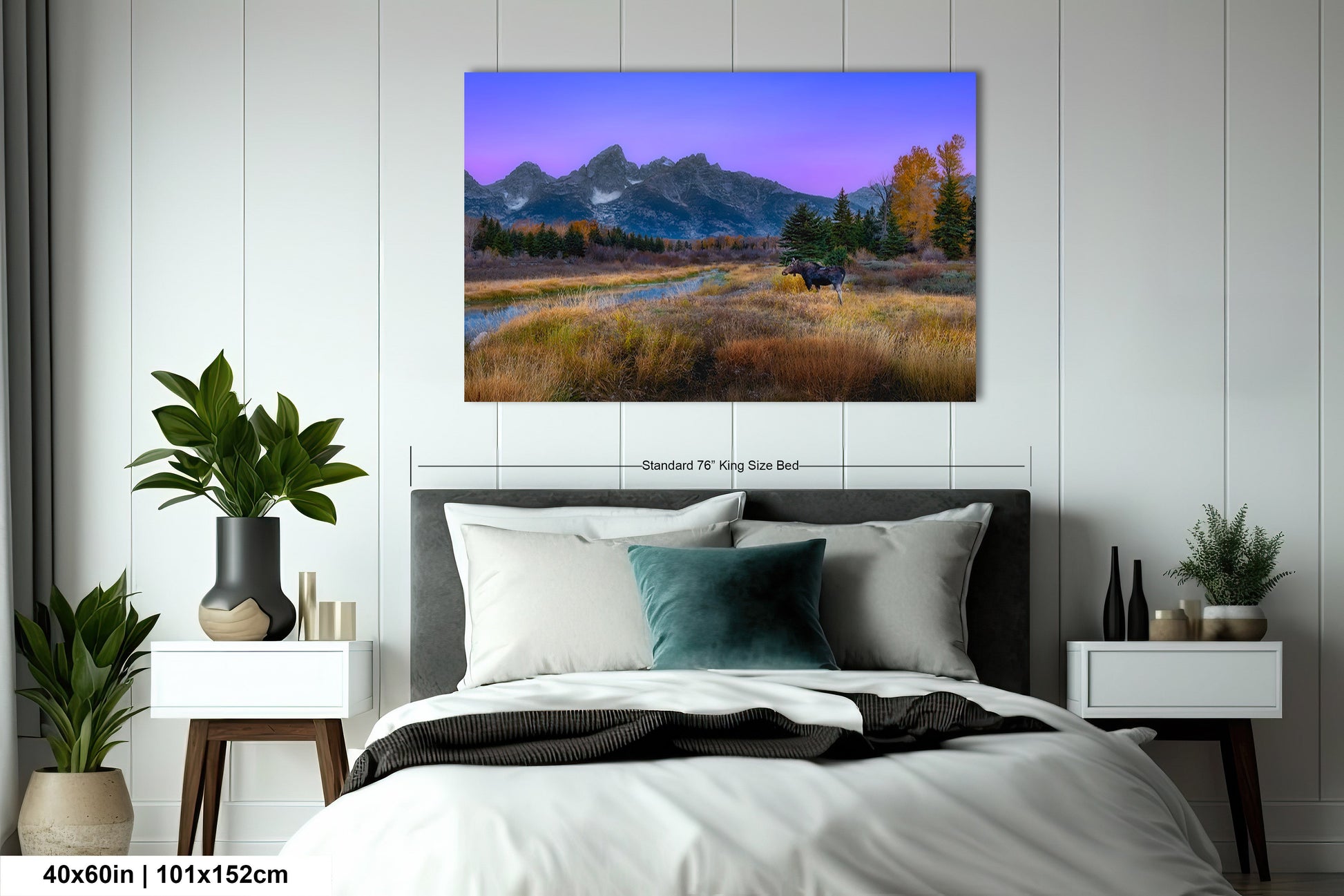 a bedroom with a bed and a painting on the wall