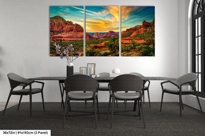 a dining room table with chairs and a painting on the wall