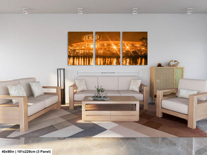 a living room filled with furniture and a painting on the wall