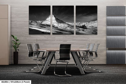 a black and white photo of a dining room table