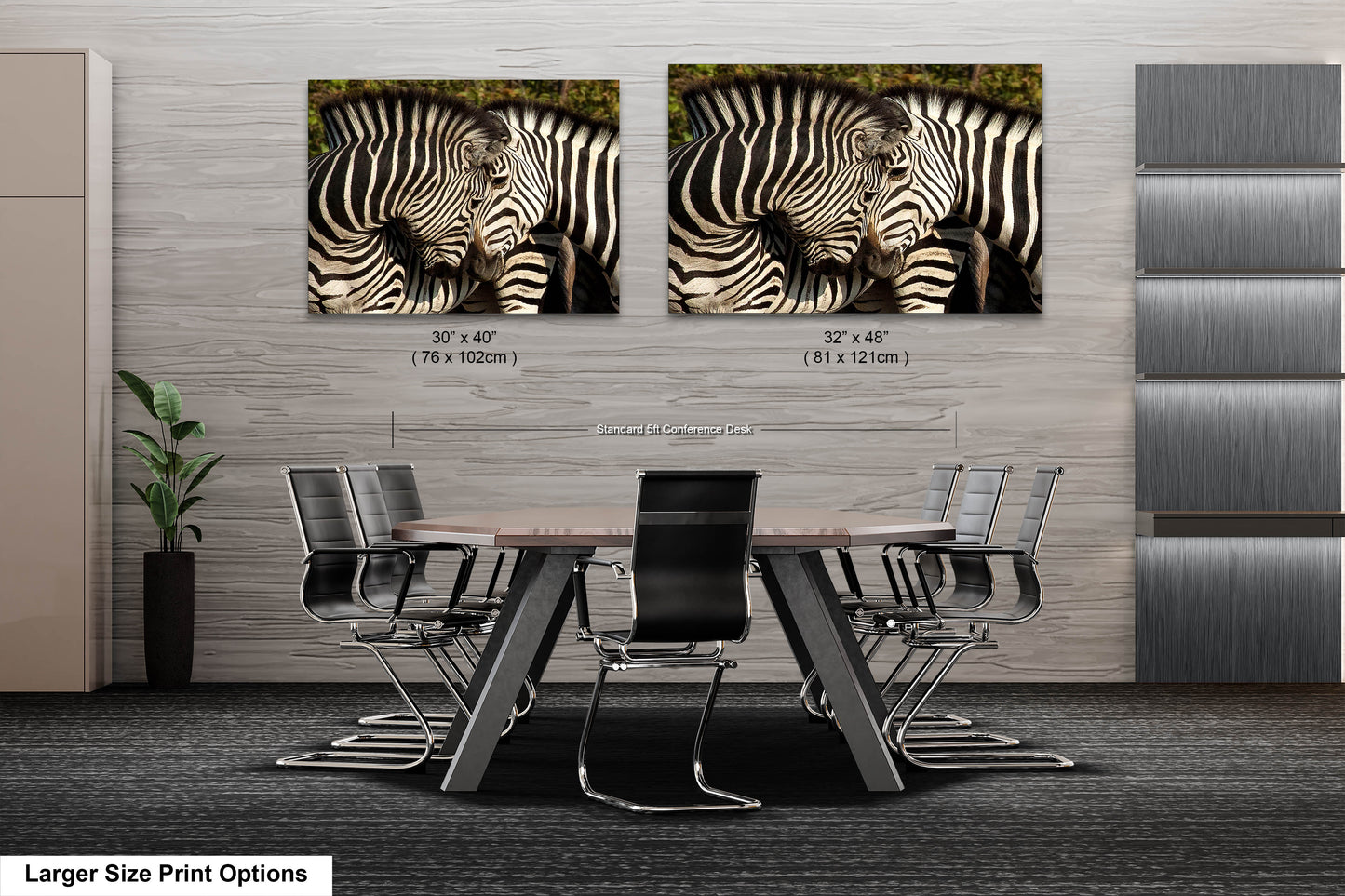 a couple of zebras standing next to each other